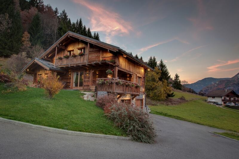 Alpine chalet at sunset